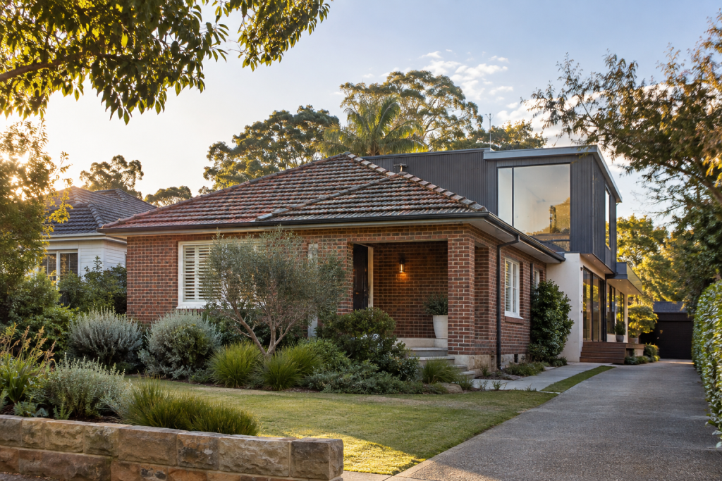 Illustrative renovated brick home with contemporary extension in Epping, Sydney